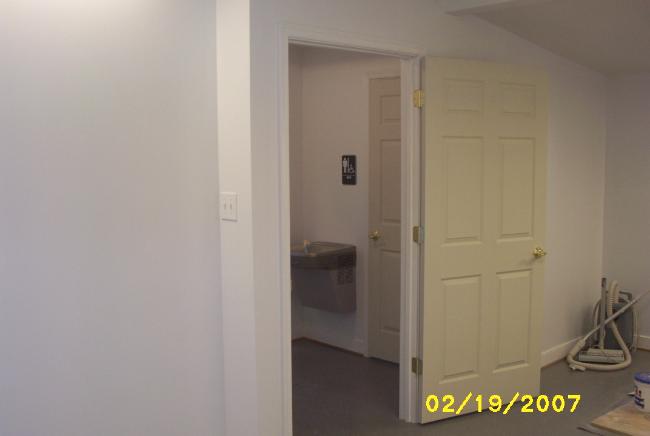 3016-A - Looking from the rear room into the Common Area with restrooms